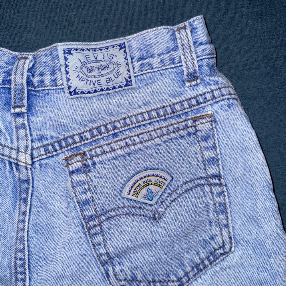 Thrifted raw hem Levi denim cut off shorts